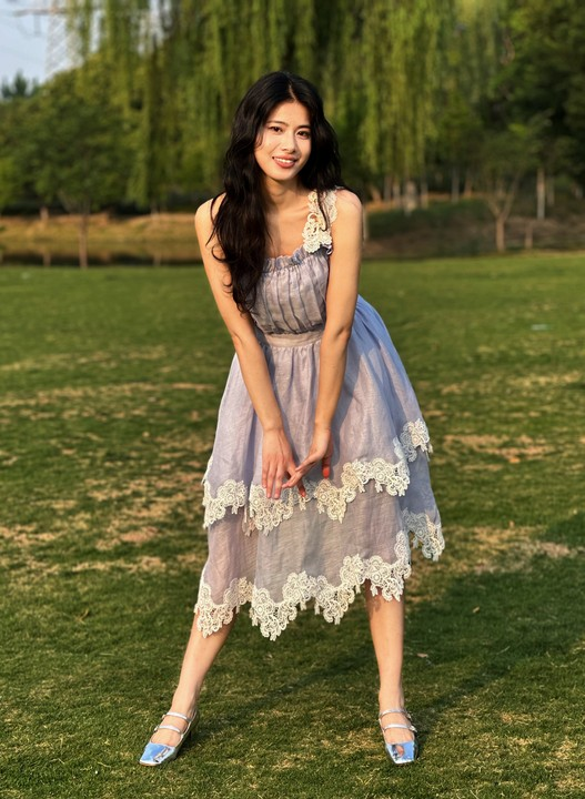 Purple dress with two-layer embroidered skirt