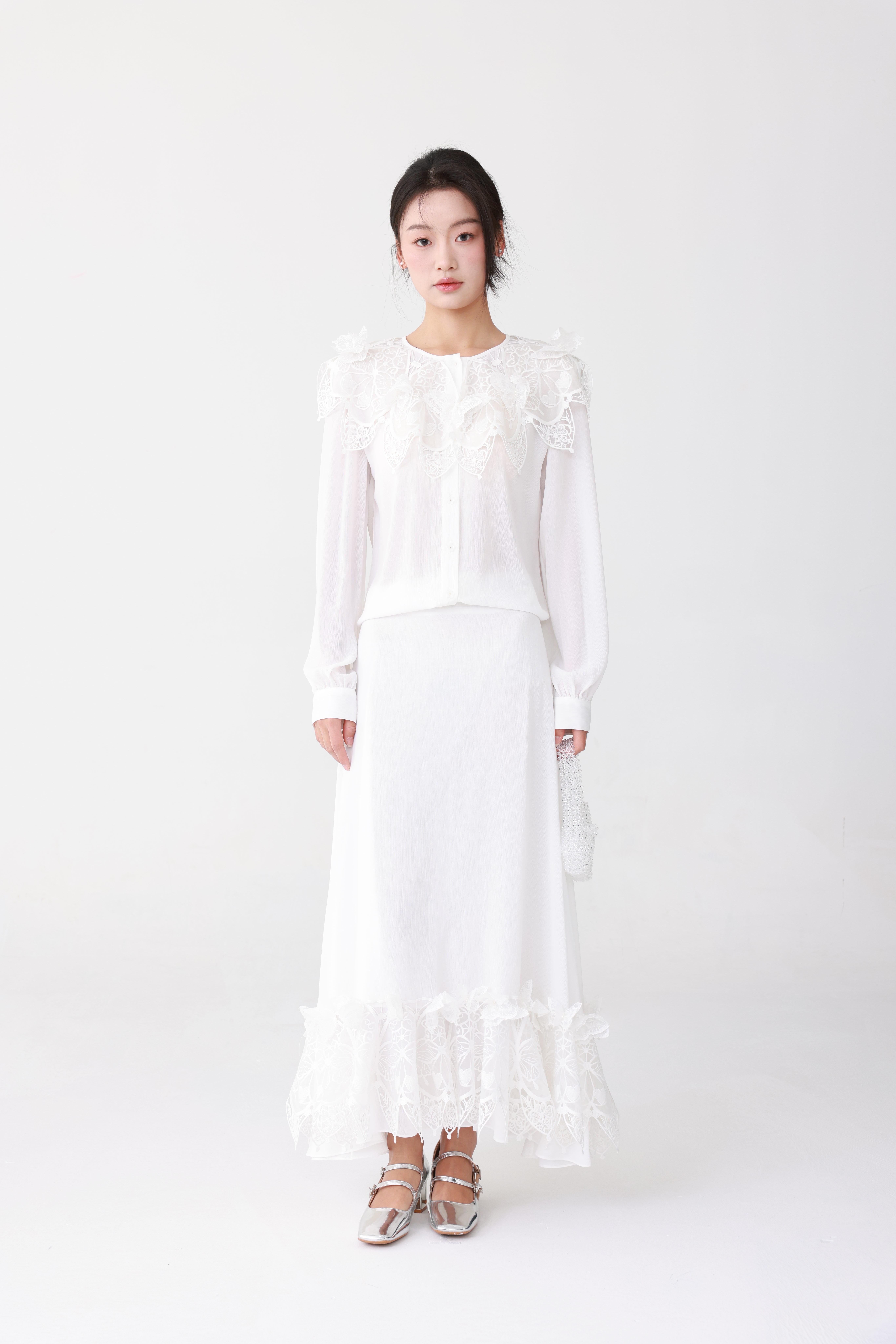 Embroidered white suit