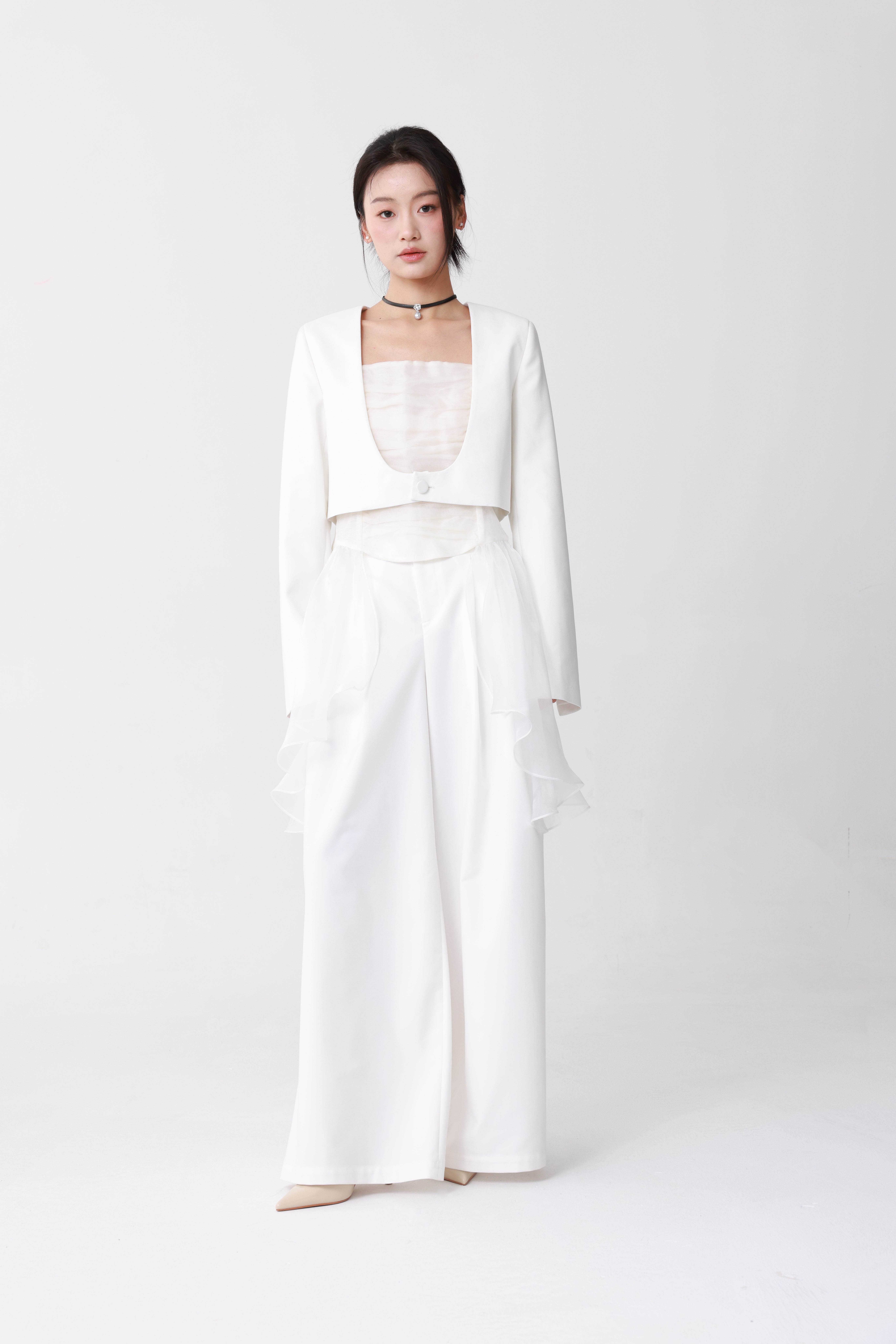 White suit with Fishtail top