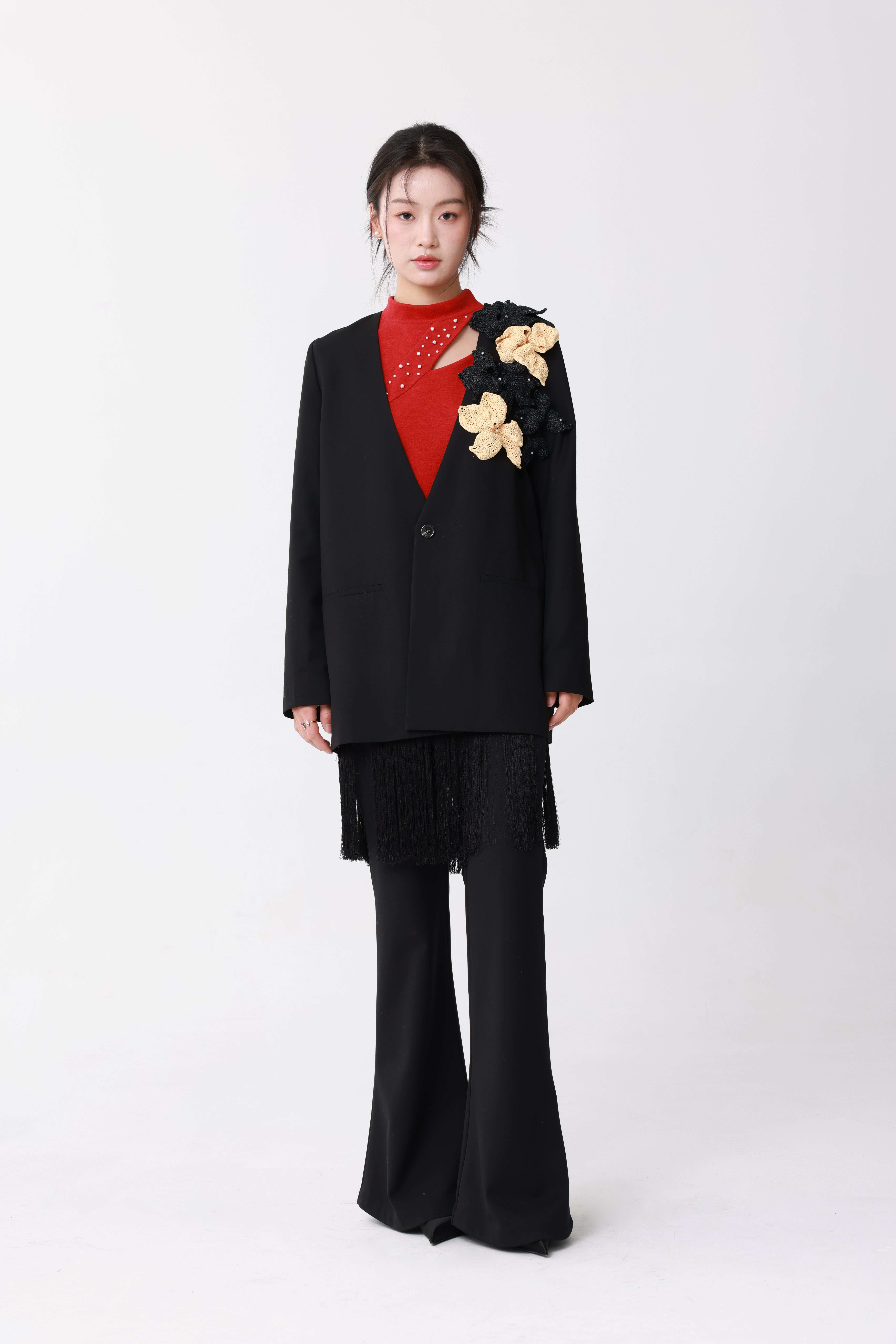Black jacket with raffia